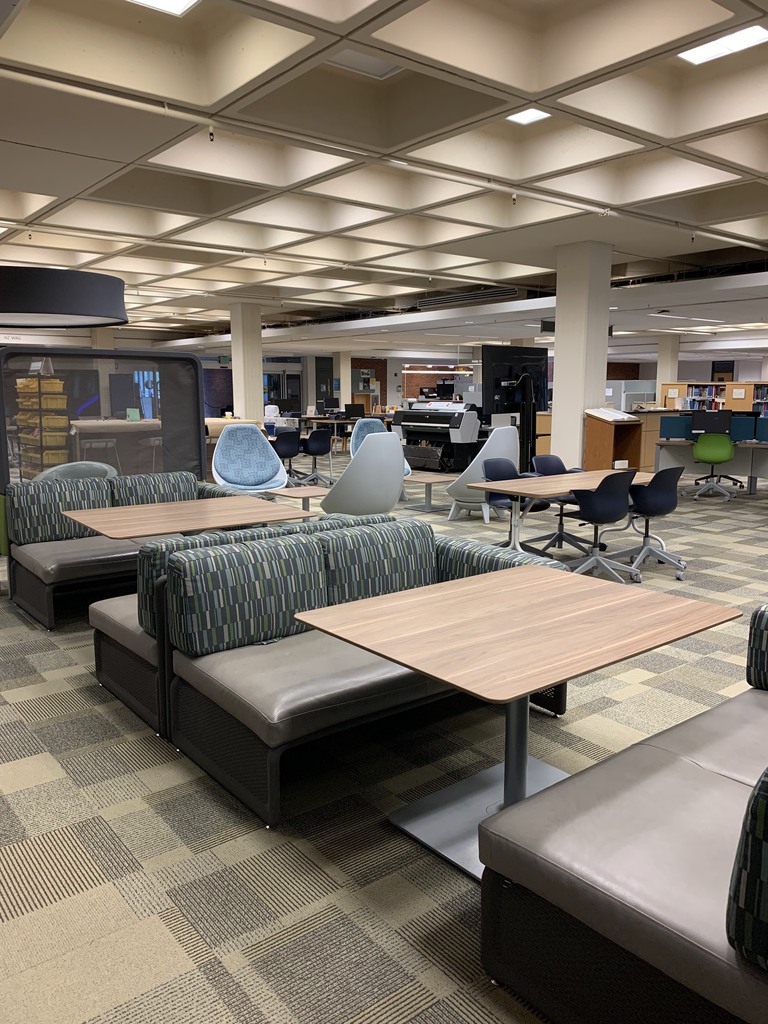 two-seater booths in front of tables