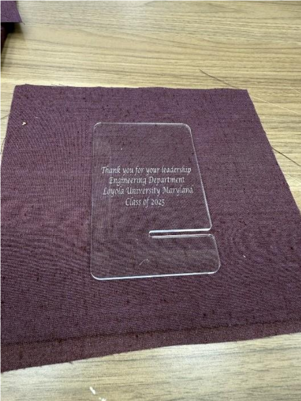 Clear acrylic piece with engraved message: Thank you for your leadership. Engineering Department Loyola University Maryland Class of 2025